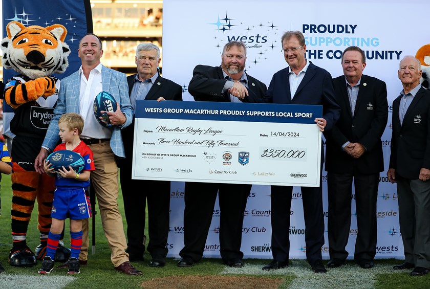 Wests Group Macarthur Chair, Alan Buxton presents cheque to NSWRL CEO,  David Trodden