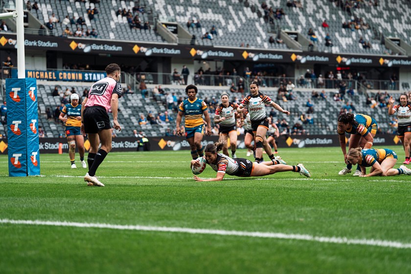Proud moment... Shaylee Bent dives over for her first NRLW try for Wests Tigers