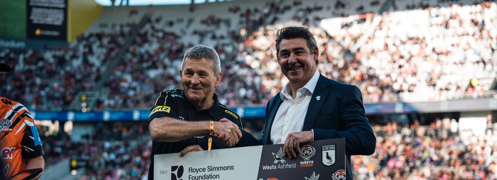 Holman Barnes Group donates $20,000 to the Royce Simmons Foundation