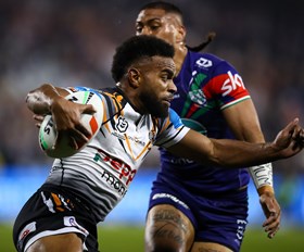 Tigers fight hard in loss to Warriors