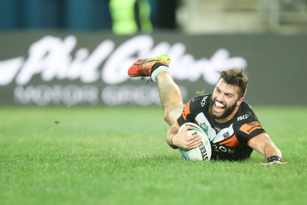 ROUND 14 — James Tedesco celebrates his second try of the night against the Rabbitohs.