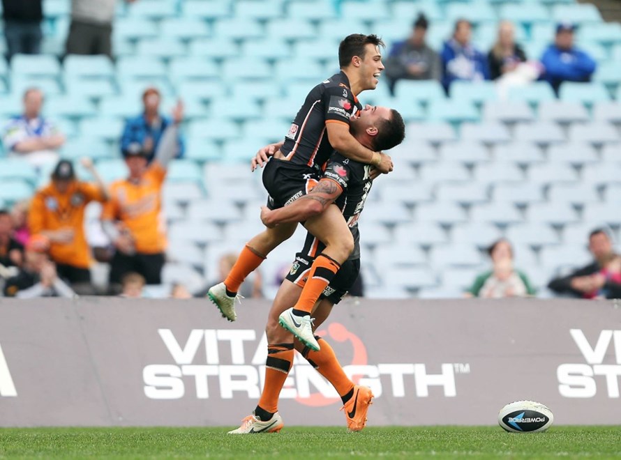 Digital Image by Robb Cox Â©nrlphotos.com: Luke Brooks celebrates his try with Bodene Thompson :NRL Rugby League - Round 19, Wests Tigers V Bulldogs at ANZ Stadium, Sunday July 20th 2014.