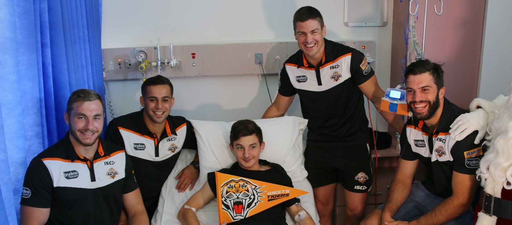 Players deliver Christmas presents at hospital