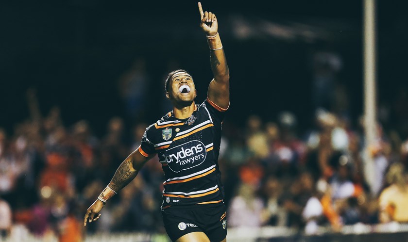 Michael Chee Kam celebrates a try against the Newcastle Knights at Scully Park, Tamworth.