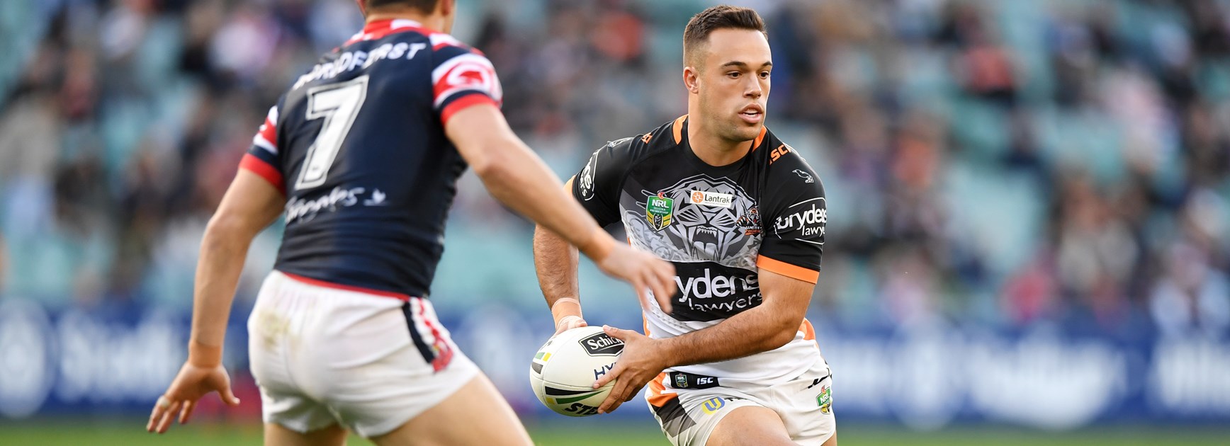 Roosters hang on to down Wests Tigers