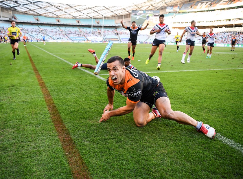 Corey Thompson scores the match-winner against the Roosters.