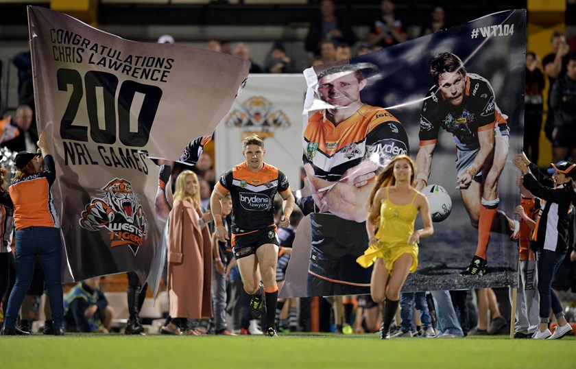 Chris Lawrence celebrates 200 NRL games for Wests Tigers in 2017.