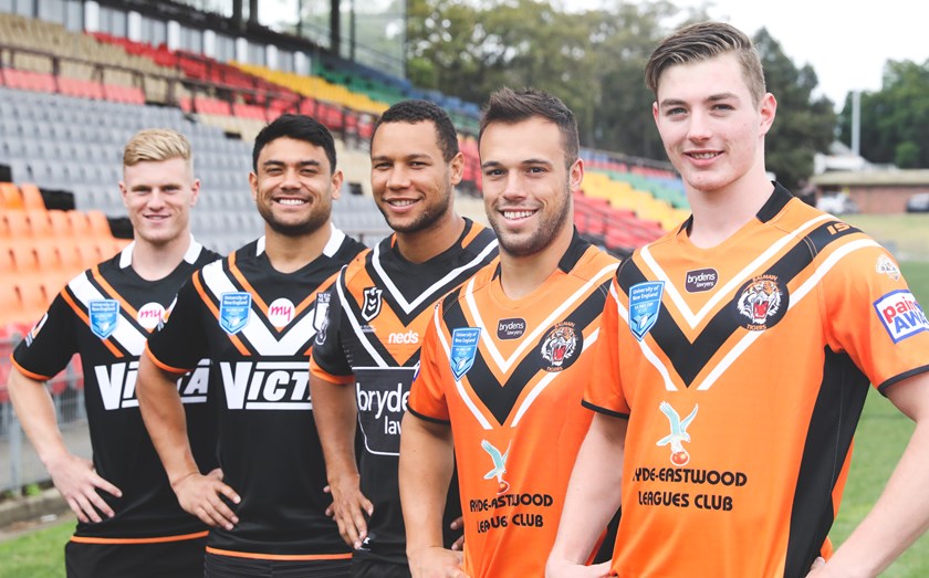 Western Suburbs Magpies juniors Cameron Lawrence and David Nofoaluma, Wests Tigers captain Moses Mbye and Balmain Tigers juniors Luke Brooks and Zane Camroux.