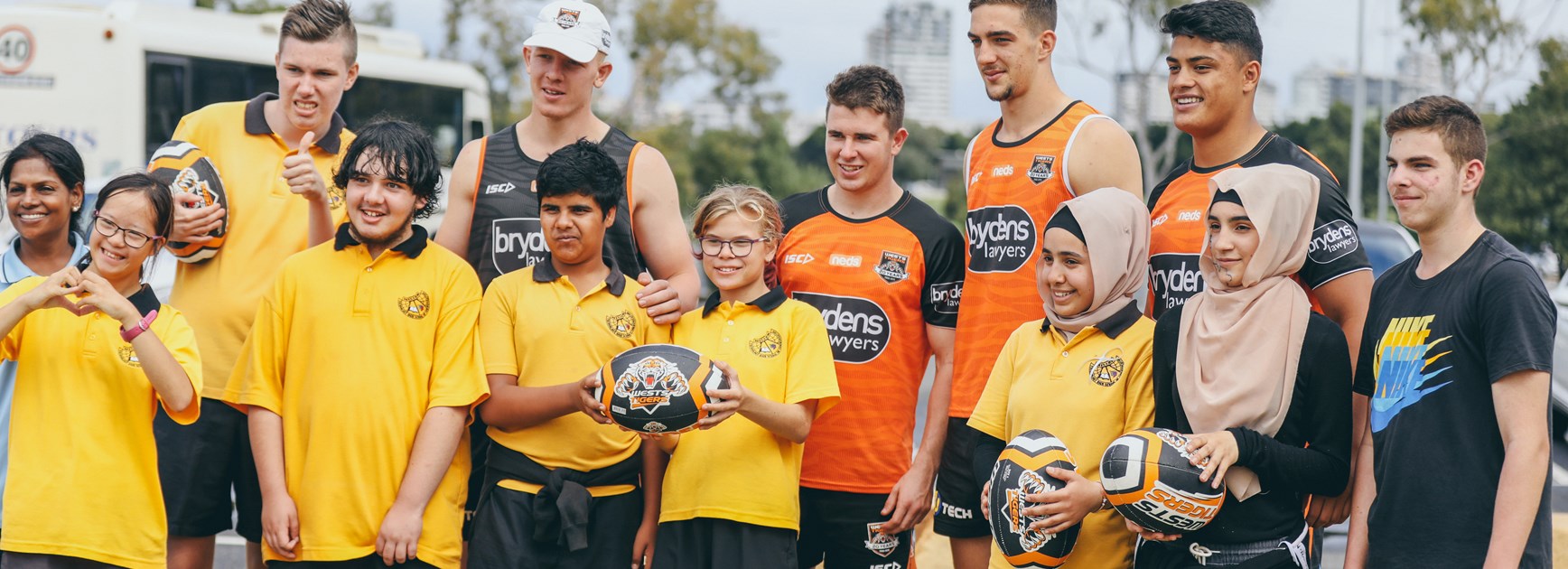 Settlement Services International partner with Wests Tigers