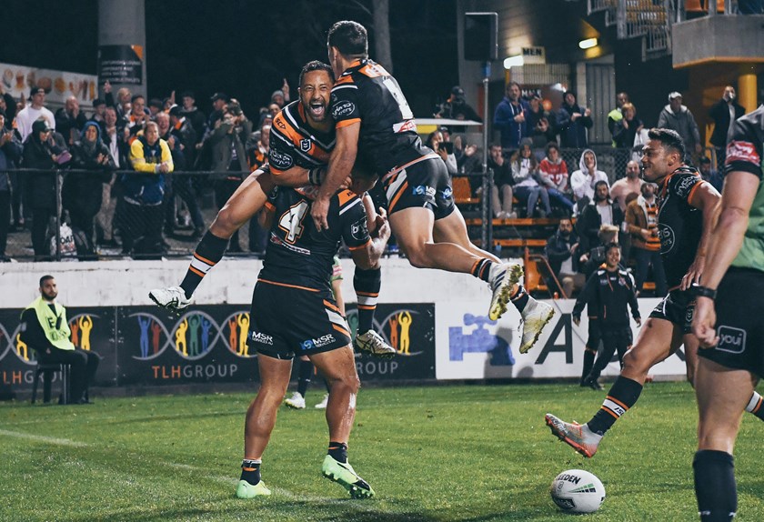 Wests Tigers celebrate a try against the North Queensland Cowboys at Leichhardt Oval