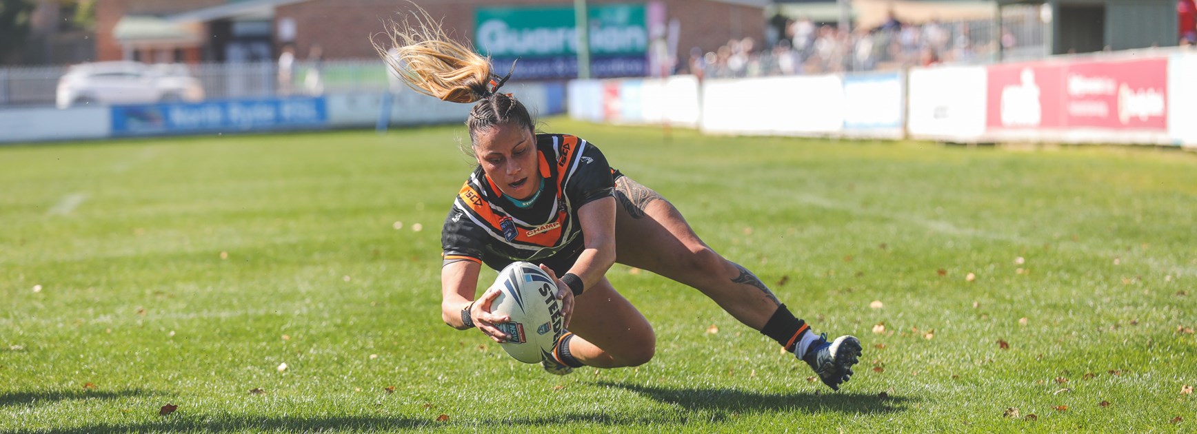 Wests Tigers battle bravely in Rabbitohs defeat