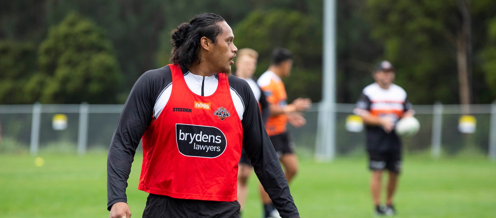 Wet weather training as boys prepare for the Titans