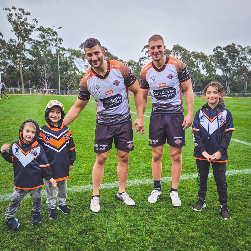 Wests Tigers players Alex Twal, Adam Doueihi, Archer and his family.