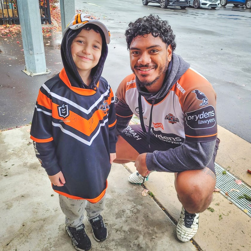 Wests Tigers player Thomas Mikaele and Archer.