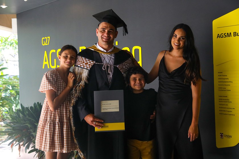 Russell Packer with his family after completing his MBA earlier this year