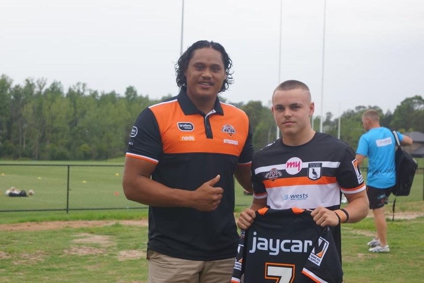 Wests Tigers forward Luciano Leilua with Luke Keppie