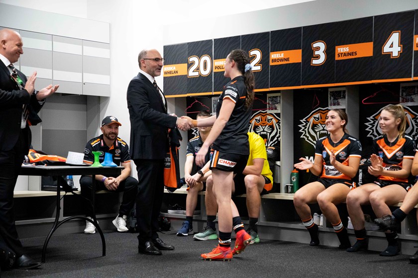 Chairman Lee Hagipantelis presenting jersey to Tess Staines