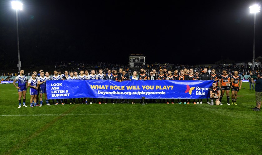 Both teams unite after a hard-fought battle for the Beyond Blue Cup