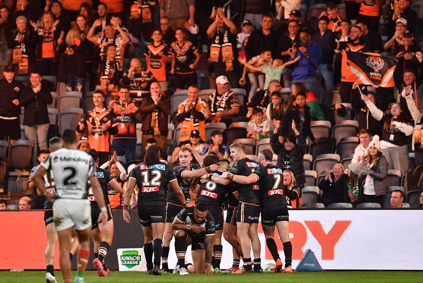 Brooks mobbed by his mates