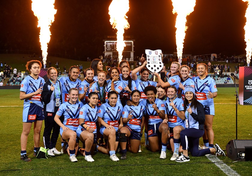 Blues Under 19's Women lifting the Origin shield at Leichhardt