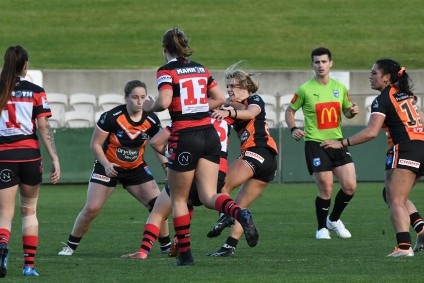 Ebony Prior and Sophie Curtain combine in the tackle