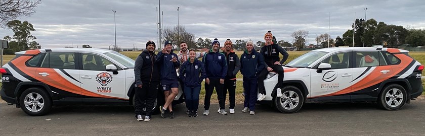 Wests Tigers staff with local NRL Game Development Officers in Dubbo