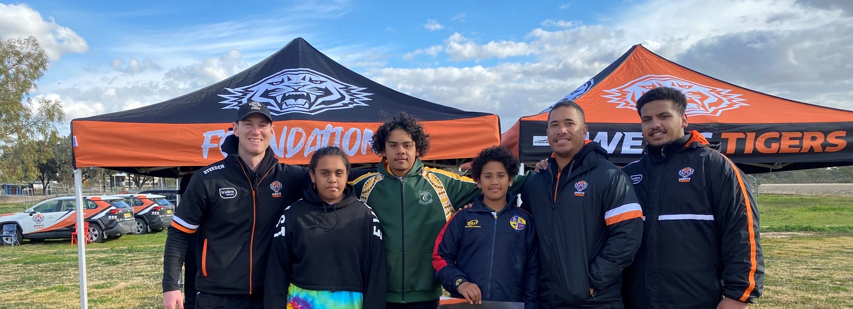 Wests Tigers staff with students from Menindee Central School 