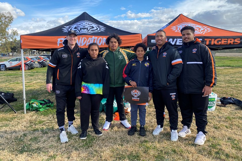 Wests Tigers staff with students from Menindee Central School 