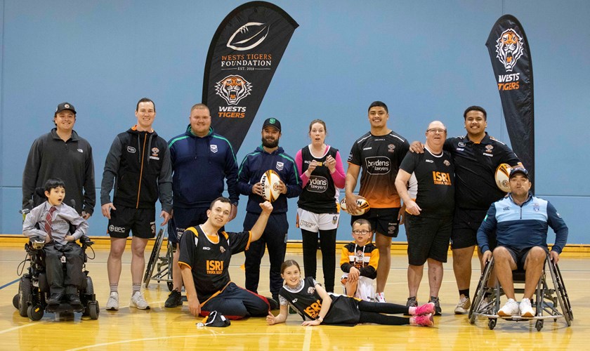 Tommy Talau with Wests Tigers and NRL staff at All Abilities clinic in Tamworth