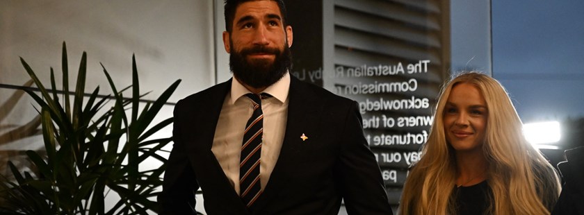 James Tamou and wife Brittney entering hearing 