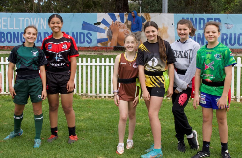 Girls having fun at all-female footy clinic in Bradbury