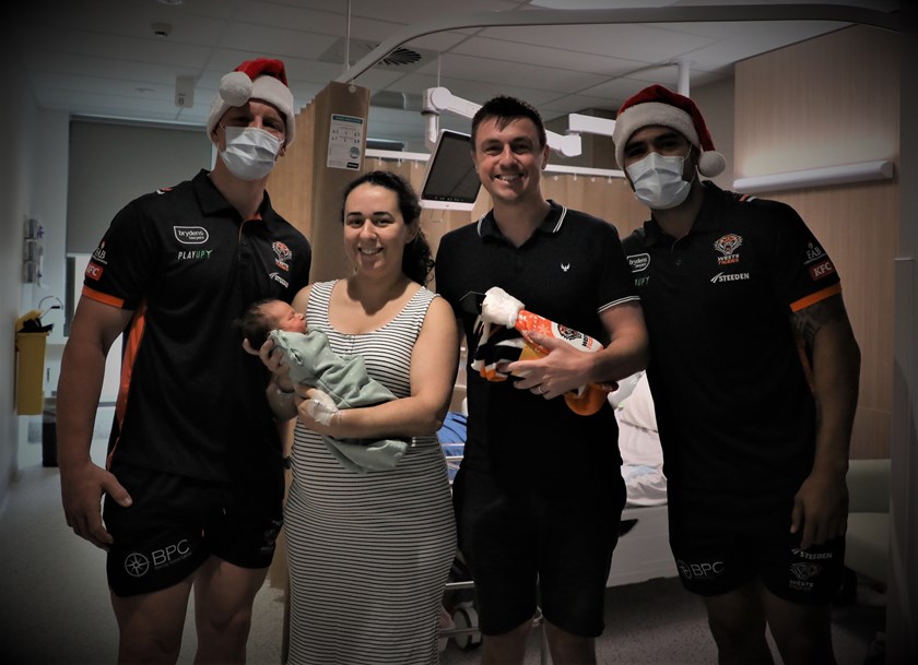 Alex and Joe handing out Christmas gifts at Campbelltown Hospital 