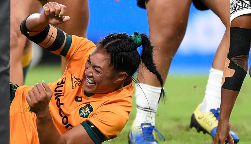 Pauline Piliae-Rasabale scoring on debut for the Wallaroos in Brisbane 