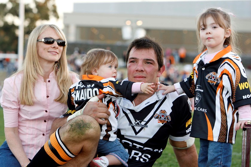 Skando with wife Jodie and daughters Olivia and Sophie after farewell game in 2006