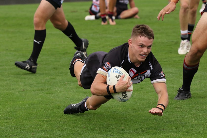 Luke Keppie scoring one of his three tries 