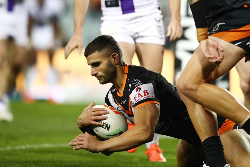 Twal grounds the ball for his first try in his 116th NRL appearance