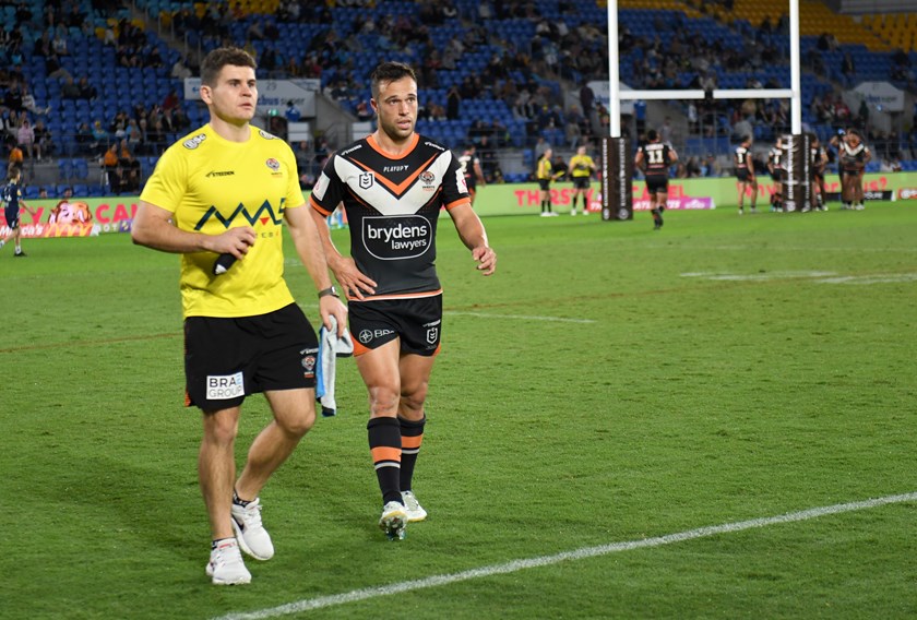 Brooks leaving the field with a hamstring injury in Round 15 on the Gold Coast