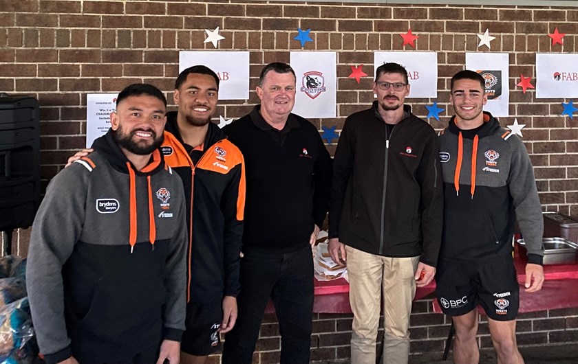 Wests Tigers Campbelltown juniors with FAB executives Laurie Fabry & Bo Soderborg