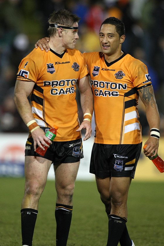 Marshall and Lawrence celebrate after 16-6 win over the Storm