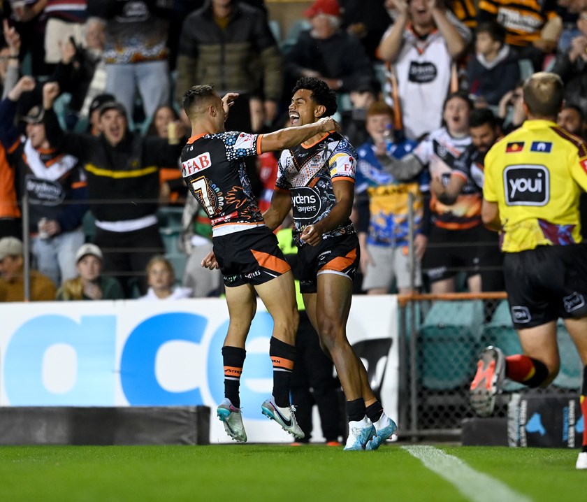 Jahream Bula scores his first NRL try in Luke Brooks' 200th game.