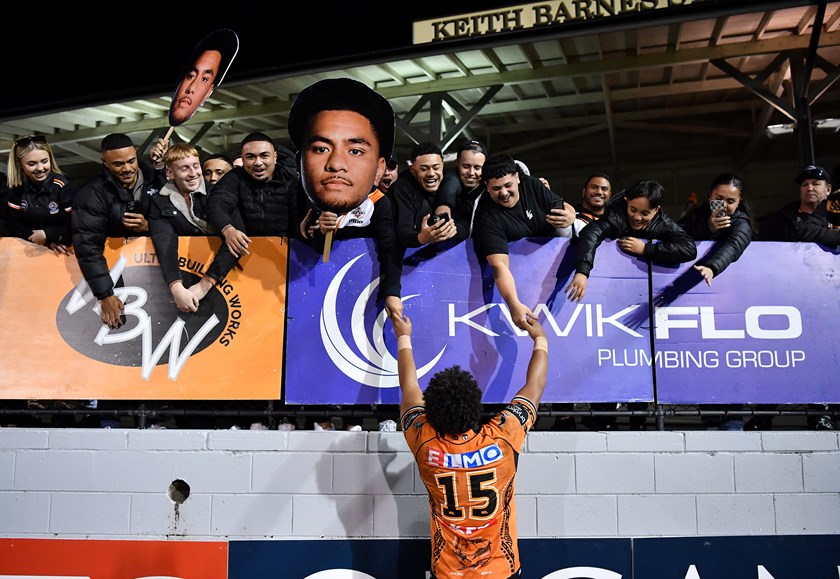 Justin greets family and friends after making his NRL debut at Leichhardt Oval in 2022