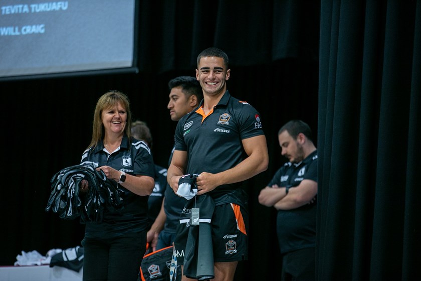 Tallyn Da Silva presenting jerseys at the Pathways induction at St Gregory's Campbelltown