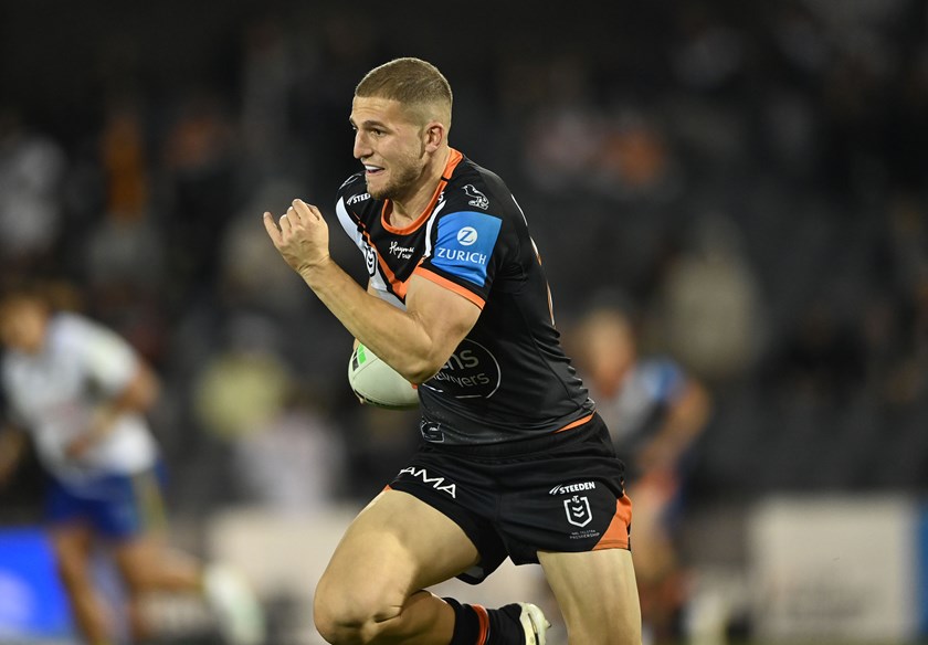 Speed to burn: Doueihi races away to score long-range try against the Raiders