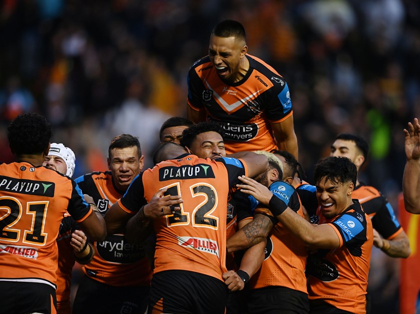 Tigers celebrate victory over the Titans in their most recent game at Leichhardt