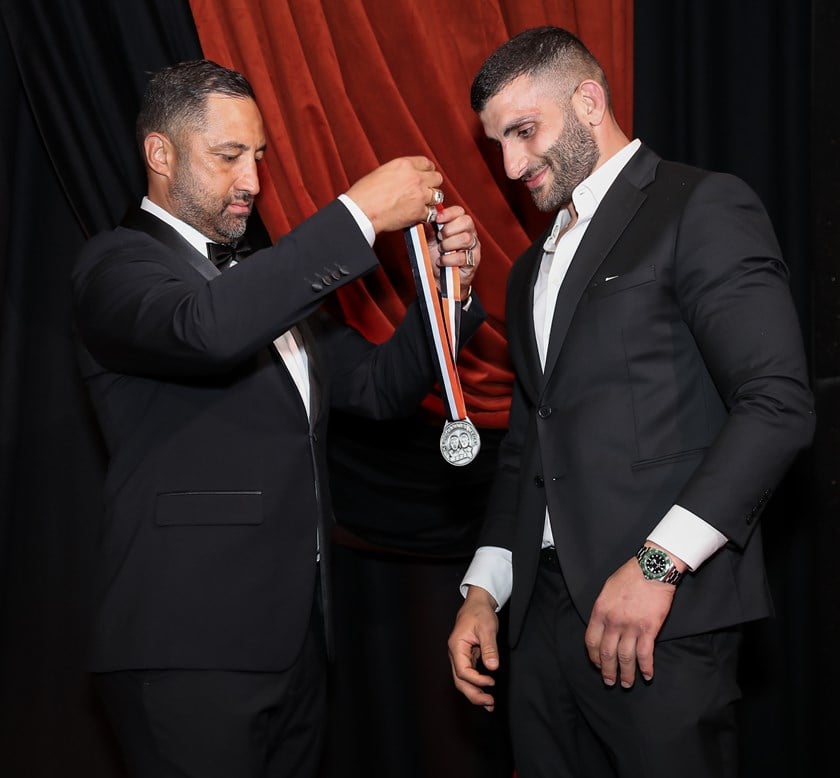 Coach Benji Marshall presents Alex Twal with the Kelly Barnes Medal for 2026