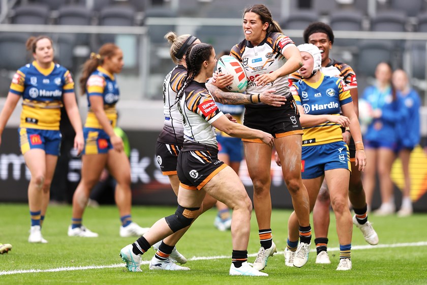 Shaylee Bent celebrates her first NRLW try for Wests Tigers in her club debut against Parramatta 