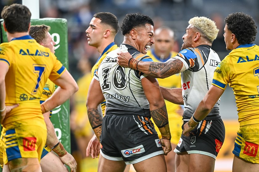 Passion...Fonua Pole celebrates his try against Parramatta Eels with Api Koroisau