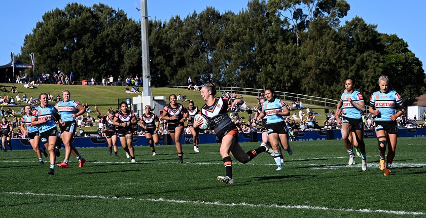 Proud moment...Kezie Apps crosses for her first try for the Tigers against the Sharks at Belmore Sports Ground in 2023