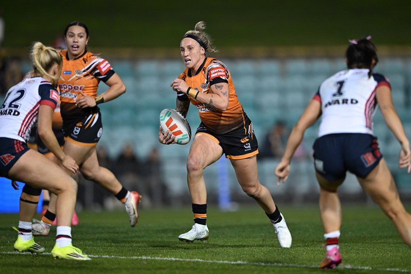 Wests Tigers lock Holli Wheeler on the charge in her 50th NRLW game 