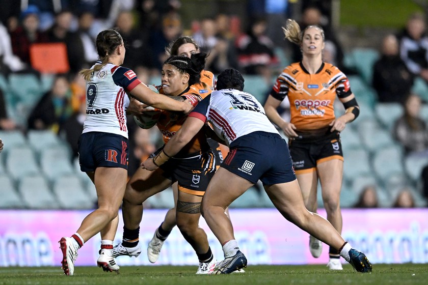 Sarah Togatuki takes a hit up in her 50th NRLW game